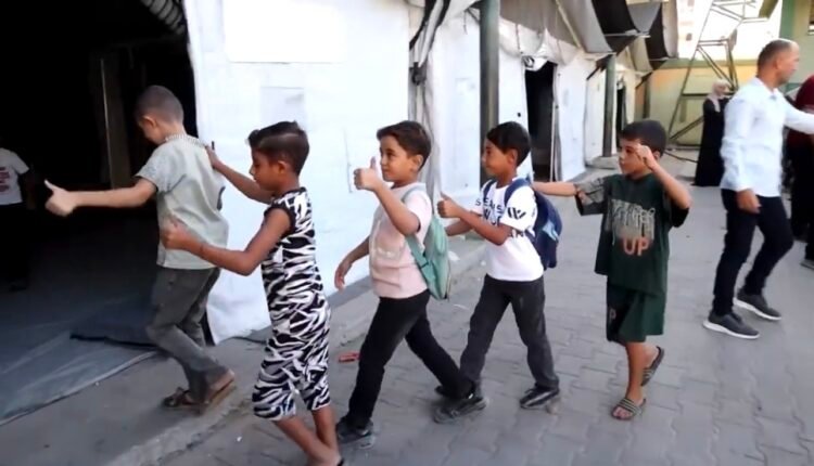 Palestinian children return to classes in Gaza as schools reopen in damaged buildings and temporary learning spaces.