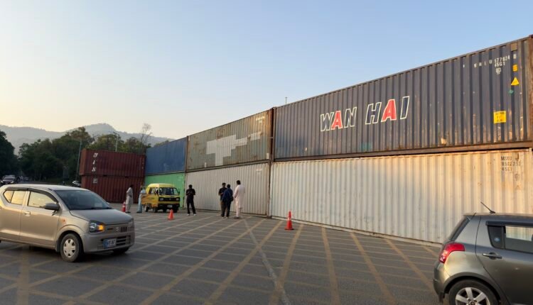 Shipping containers placed at D-Chowk in Islamabad ahead of PTI’s expected long march.